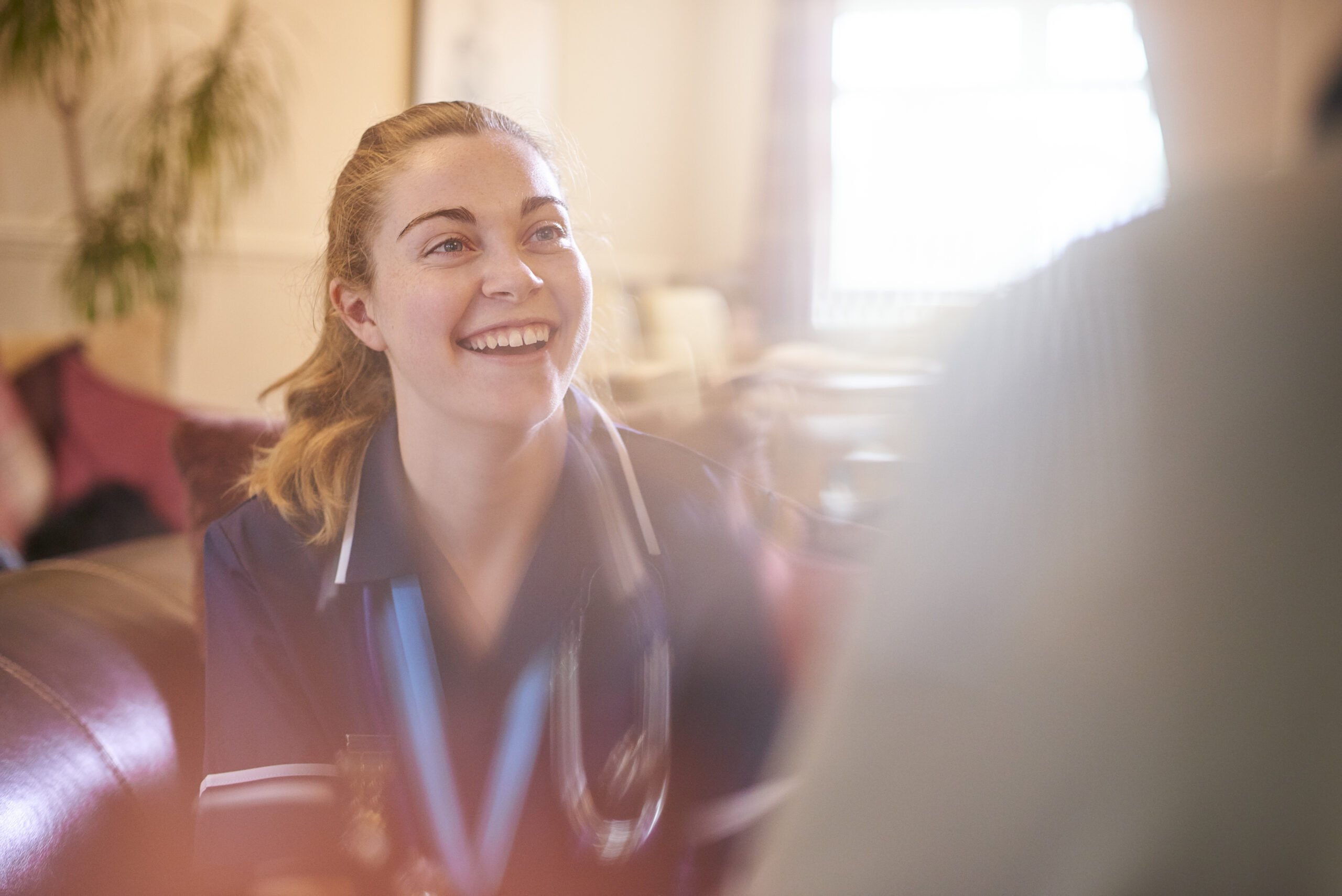 Sharing a laugh with her patient